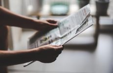 Reading Newspaper