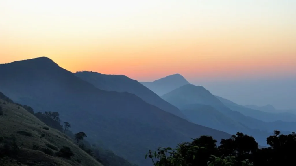 Sunrise at Thadiyandamol hills in Coorg.